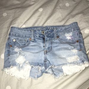 American Eagle jean shorts with lace pocket detail